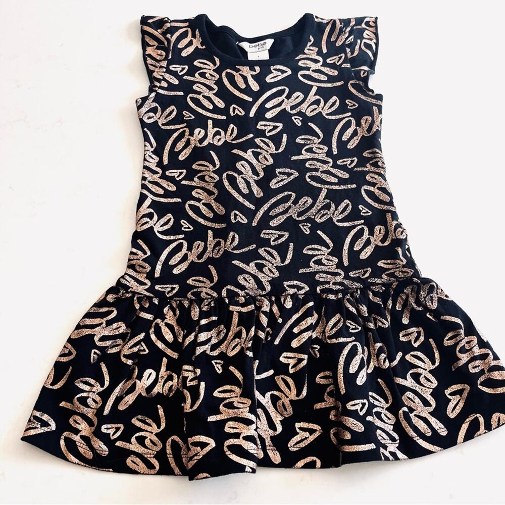 Bebe girls black jersey dress with gold Bebe words throughout size 4